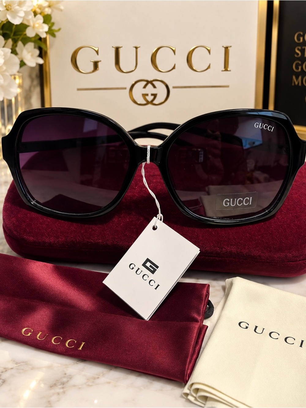 Gucci Black Frame Sunglasses with Dark Purple Lenses